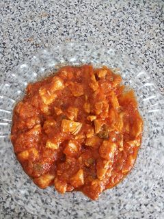 Una foto de Pollo con Tomate