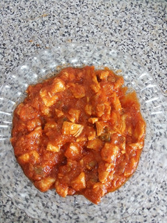 Una foto de Pollo con Tomate