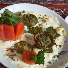 Spinach Corn Ravioli in white sauce A picture of Spinach Corn Ravioli in white sauce.