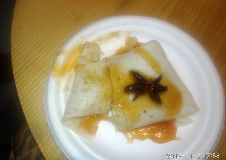 anjeerii dosaa with orange sauce recipe main photo