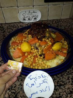 صورة لوصفة كسكس مغربي بالدجاج والتفاية