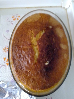 Una foto de Bizcocho de yogurt de limón con un toque de mandarina y ron moreno