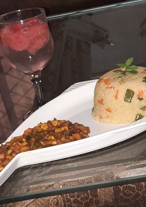 A picture of Stir fried couscous with baked beans sauce.
