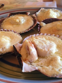 Una foto de Ostiones a la parmesana
