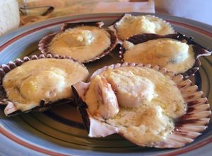 Una foto de Ostiones a la parmesana