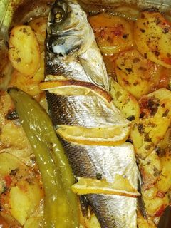 صورة لوصفة سمك 🐟🐟 بالبطاطا 🥔 في الفرن