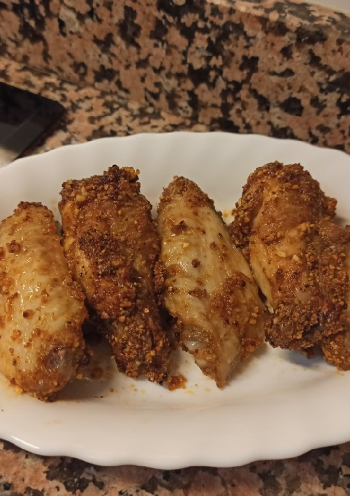 Una foto de Alitas de pollo "suya" en freidora de aire