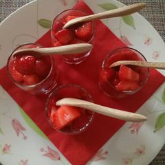 A picture of Martini and strawberry salad.