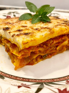 Una foto de Lasaña con carne y pisto
