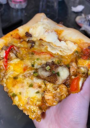 Une photo de Pizza fourrée 🤤🧀