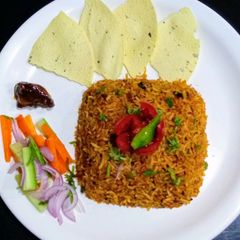 A picture of Tomato Rice with a twist.