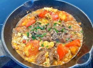 Hình của món Bò trứng sốt cà.