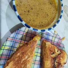 A picture of Grilled Cheese and Pastrami with French Au Jus Dip.