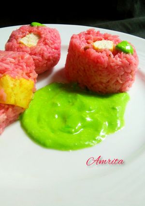 A picture of Beetroot fried rice with Buttery Tofu.