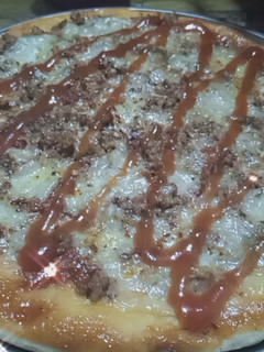 A picture of Pizza with beef qeema filling.