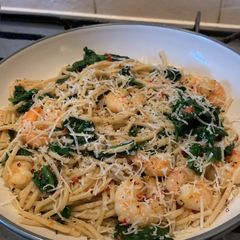 A picture of Spaghetti with prawns, baby spinach, chilli and garlic.