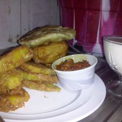 A picture of Fried Sweet potatoe with egg & milk pap.