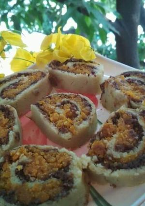 A picture of Carrot Halwa and Bread Swiss Roll.
