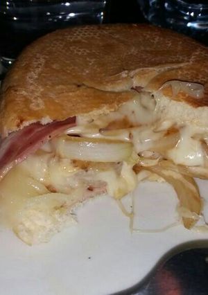 A picture of Bacon, Onion, and Cheese Sandwich.
