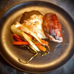 Glazed Braised Duck Breast on a Signature Mashed Potatoes served with Glazed Carrots and Pak Choi A picture of Glazed Braised Duck Breast on a Signature Mashed Potatoes served with Glazed Carrots and Pak Choi.