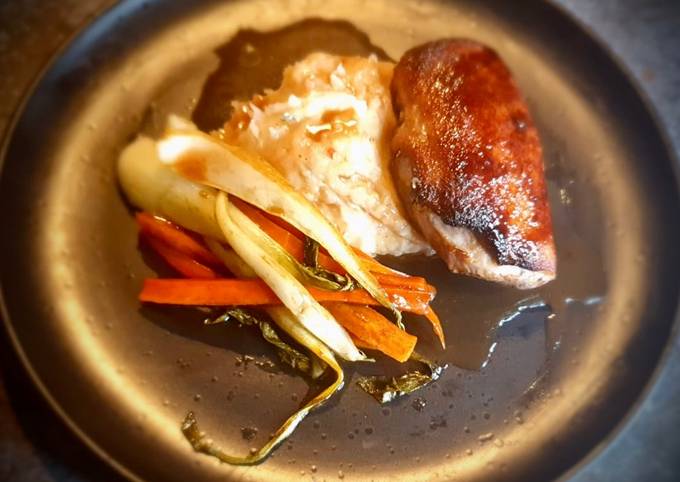 Glazed Braised Duck Breast on a Signature Mashed Potatoes served with Glazed Carrots and Pak Choi