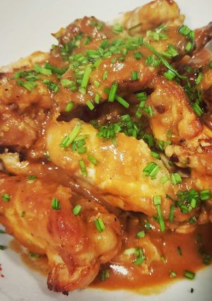 Una foto de Alitas picantes (buffalo wings)