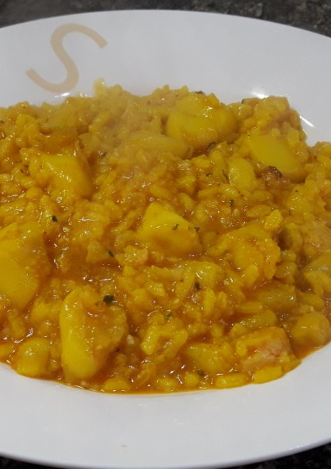 Una foto de Arroz con coliflor y sepia