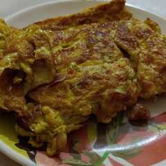 A picture of ডিমের অমলেট (dimer omelette recipe in Bemngali).