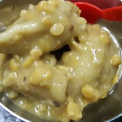 A picture of Coconut dal pithe in bengali style.