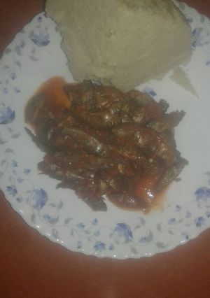 A picture of Small fish with ugali.