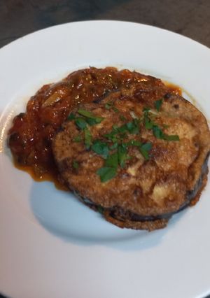 A picture of Fried Eggplant with Spanish Tomato Sauce.