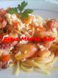 Bavette con Tentacoli di Calamari e Surimi di Granchio sfumati al Cognac e Pomodorini Freschi