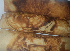 Una foto de Panqueques con dulce de leche