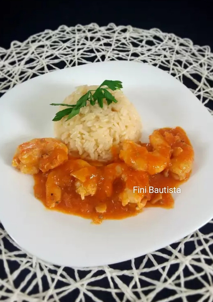 Una foto de Langostinos en salsa