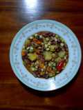 Githeri (Green maize- red bean salsa with vegetables)
