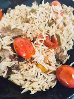 Una foto de Arroz Basmati con Ternera, Pimientos, Cebolla, Cherrys y Yakiniku