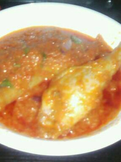 A picture of Tomatoes stew.