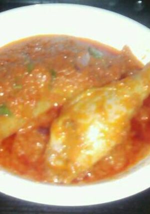 A picture of Tomatoes stew.