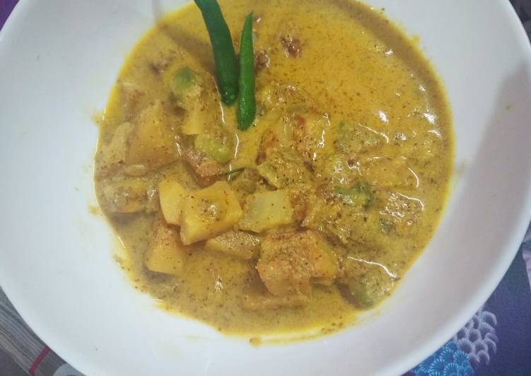 Recipe of Homemade Jhinge aloo posto