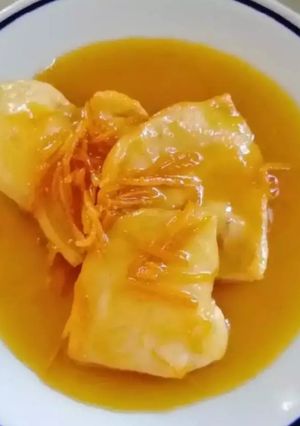 O poză a rețetei Piept de pui în sos de portocală și portocală caramelizată.
