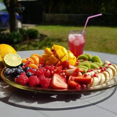 Summer Fruit Platter & Pomegranate Juice A picture of Summer Fruit Platter & Pomegranate Juice.