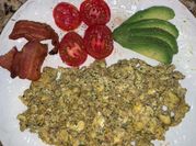 A picture of scrambled egg and avocado