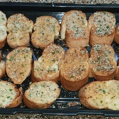 A picture of French toast with garlic butter.