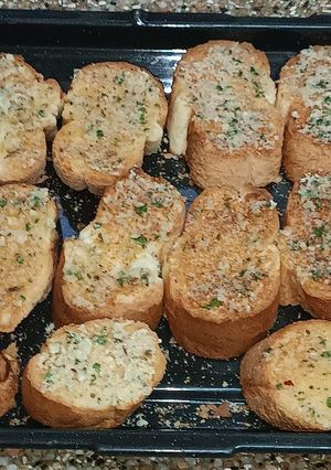 A picture of French toast with garlic butter.