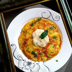 A picture of Potato upside down Omelette.