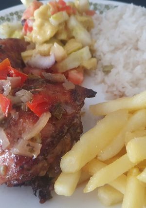 Una foto de Pollo en Braza al horno - (Dos personas)
