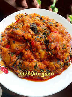 A picture of Beans and plantain with pumpkin leaf.