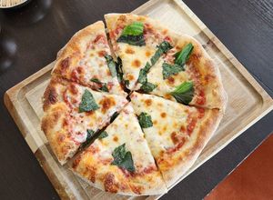 Una foto de Pizza con biga
