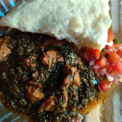 A picture of Ugali and spinachsukumawiki and beef.