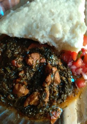A picture of Ugali and spinachsukumawiki and beef.